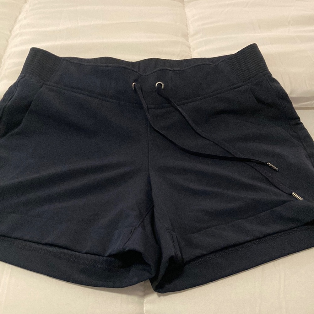 Like new never worn Navy Athleta super soft shorts